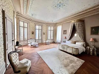Un ou plusieurs lits dans un hébergement de l'établissement Chateau les Villettes
