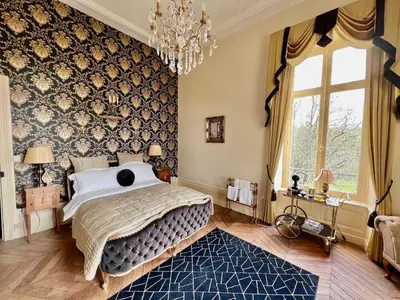 Un ou plusieurs lits dans un hébergement de l'établissement Chateau les Villettes