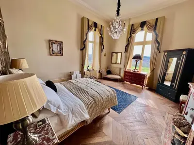 Un ou plusieurs lits dans un hébergement de l'établissement Chateau les Villettes