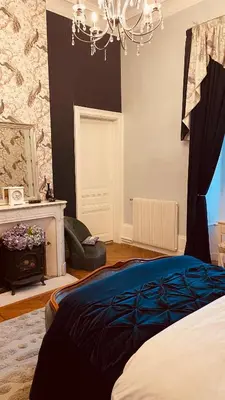 Un ou plusieurs lits dans un hébergement de l'établissement Chateau les Villettes