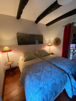 Un ou plusieurs lits dans un hébergement de l'établissement Gîte Maison Maitri