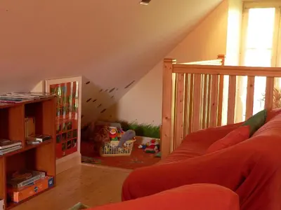 Coin salon dans l'établissement Maison d'Hôtes La Nichée