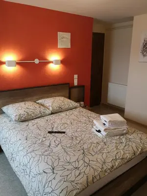Un ou plusieurs lits dans un hébergement de l'établissement L'auberge des quatre routes