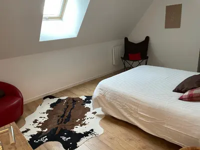 Un ou plusieurs lits dans un hébergement de l'établissement La grange