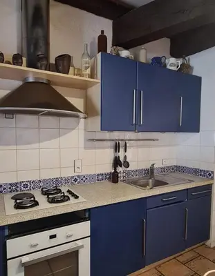 Cuisine ou kitchenette dans l'établissement Dans la Cité de Rocamadour L'Oustal de Beline