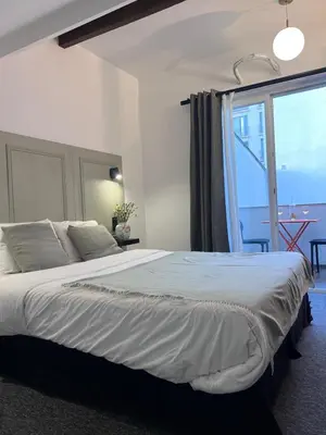Un ou plusieurs lits dans un hébergement de l'établissement VILLA VLAS - Chambre d'Hôte - Limoges