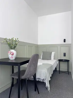 Un ou plusieurs lits dans un hébergement de l'établissement VILLA VLAS - Chambre d'Hôte - Limoges