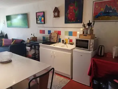 Cuisine ou kitchenette dans l'établissement La bohème