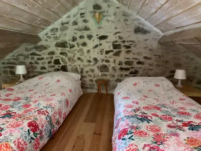 Un ou plusieurs lits dans un hébergement de l'établissement Petite maison Conjat