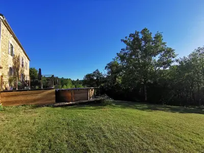 Jardin de l'établissement Maison typique périgourdine avec piscine