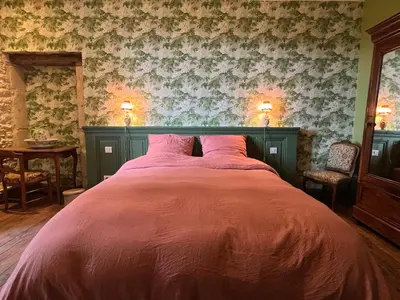 Un ou plusieurs lits dans un hébergement de l'établissement Le Clos Chalmon Chambre d'hôte
