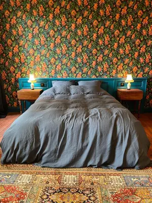 Un ou plusieurs lits dans un hébergement de l'établissement Le Clos Chalmon Chambre d'hôte