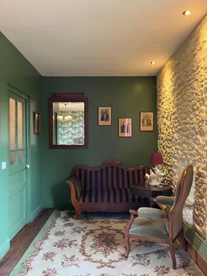 Coin salon dans l'établissement Le Clos Chalmon Chambre d'hôte