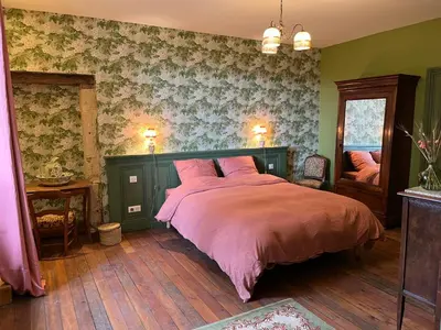 Un ou plusieurs lits dans un hébergement de l'établissement Le Clos Chalmon Chambre d'hôte