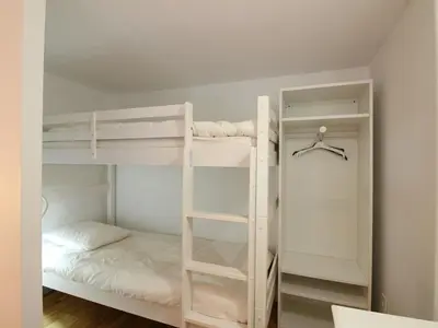 Un ou plusieurs lits dans un hébergement de l'établissement La Bourboule: Appartement T2 Duplex 3* Hyper Centre avec Parking - FR-1-608-233