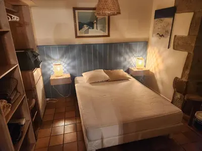 Un ou plusieurs lits dans un hébergement de l'établissement Villa La Cayrouse Piscine Tennis Boulodrome