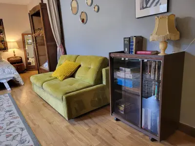 Coin salon dans l'établissement Chambre Familiale