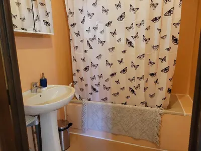 Salle de bains dans l'établissement Chambre Familiale