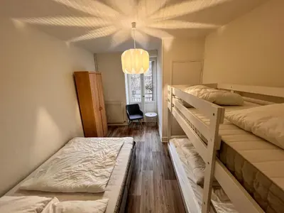 Un ou plusieurs lits dans un hébergement de l'établissement Appartement 4 personnes, wifi, proche centre et thermes