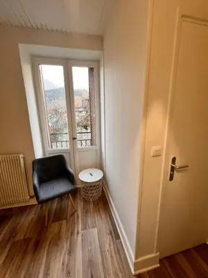 Coin salon dans l'établissement Appartement 4 personnes, wifi, proche centre et thermes