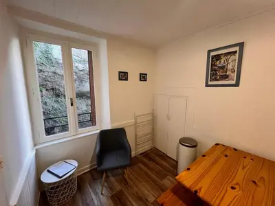 Coin salon dans l'établissement Appartement 4 personnes, wifi, proche centre et thermes