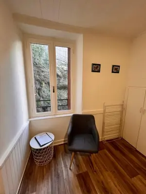 Coin salon dans l'établissement Appartement 4 personnes, wifi, proche centre et thermes