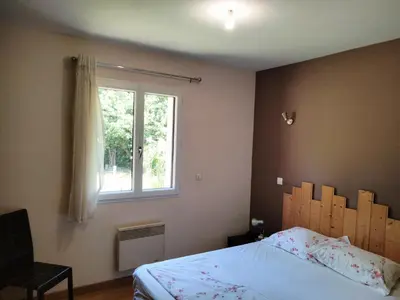 Un ou plusieurs lits dans un hébergement de l'établissement Maison du rieu 8 personnes