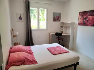 Un ou plusieurs lits dans un hébergement de l'établissement Maison du rieu 8 personnes