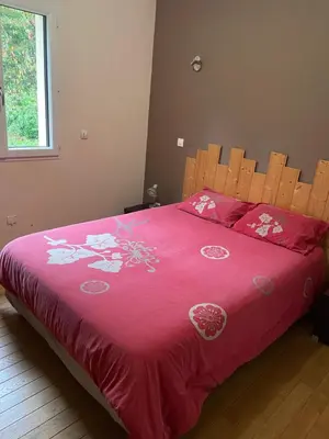 Un ou plusieurs lits dans un hébergement de l'établissement Maison du rieu 8 personnes