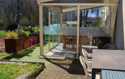Jardin de l'établissement Entre Puy-de-Dôme et Corrèze Appartement pour 4 personnes avec terrasse et jardin