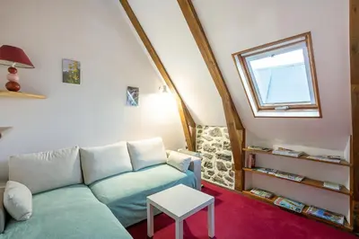 Coin salon dans l'établissement Gite Les Marmottes