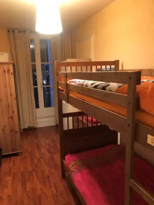 Un ou plusieurs lits dans un hébergement de l'établissement Le Rubis de Chanterive appartement dans superbe maison de maître