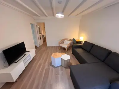 Télévision ou salle de divertissement dans l'établissement Appartement RDC 9 personnes, 2 chambres, wifi, proche du centre