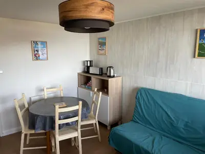 Coin salon dans l'établissement Appartement 4 pers Tour de la Biche skis aux pieds