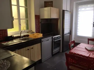 Cuisine ou kitchenette dans l'établissement La Residence rdc