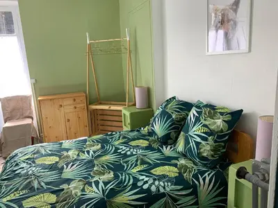 Un ou plusieurs lits dans un hébergement de l'établissement La Residence rdc