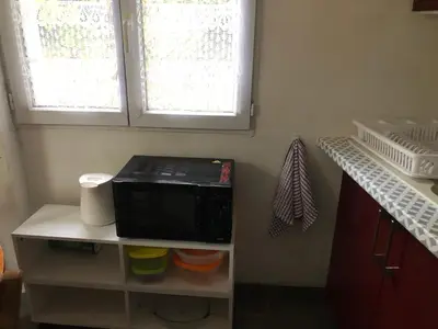 Cuisine ou kitchenette dans l'établissement Studiodupuyblanc