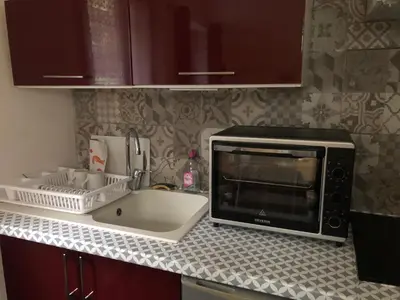 Cuisine ou kitchenette dans l'établissement Studiodupuyblanc