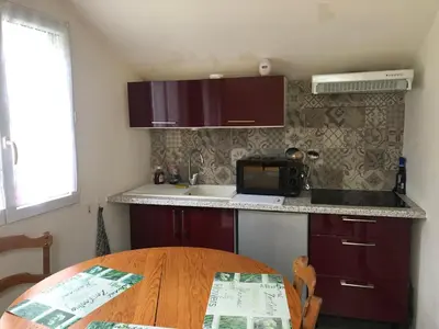 Cuisine ou kitchenette dans l'établissement Studiodupuyblanc
