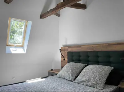 Un ou plusieurs lits dans un hébergement de l'établissement Villa avec jaccuzi