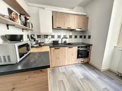 Cuisine ou kitchenette dans l'établissement Résidence Bury