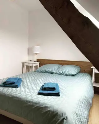 Un ou plusieurs lits dans un hébergement de l'établissement Petite grange de charme à Miers