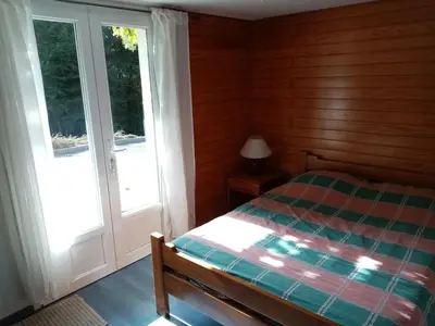 Un ou plusieurs lits dans un hébergement de l'établissement Chambre calme en correze