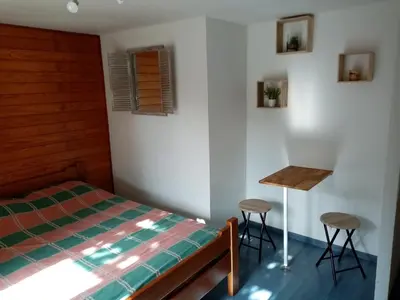 Un ou plusieurs lits dans un hébergement de l'établissement Chambre calme en correze