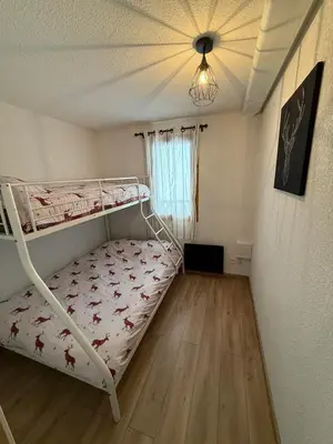 Un ou plusieurs lits dans un hébergement de l'établissement Appartement 2 pièces, les Chalets de Super-Besse