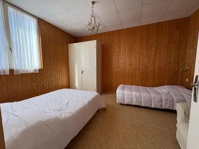 Un ou plusieurs lits dans un hébergement de l'établissement Villa Prairie Mont-Dore Appartements