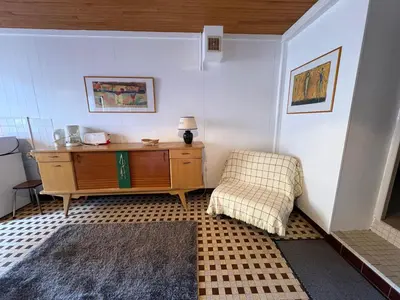 Coin salon dans l'établissement Villa Prairie Mont-Dore Appartements