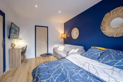 Un ou plusieurs lits dans un hébergement de l'établissement Esprit cosy - Welc'Home