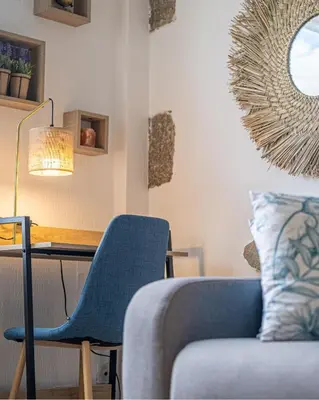 Coin salon dans l'établissement Petit nid douillet - Welc'Home