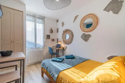 Un ou plusieurs lits dans un hébergement de l'établissement Petit nid douillet - Welc'Home